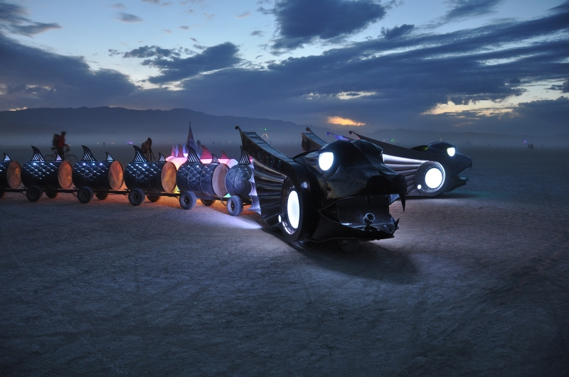 Illustration for article titled And now, two 50-foot-long cars shaped like mythological serpents